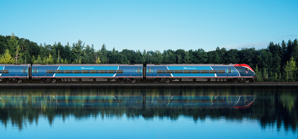 Side view of new Amtrak equipment passing lake