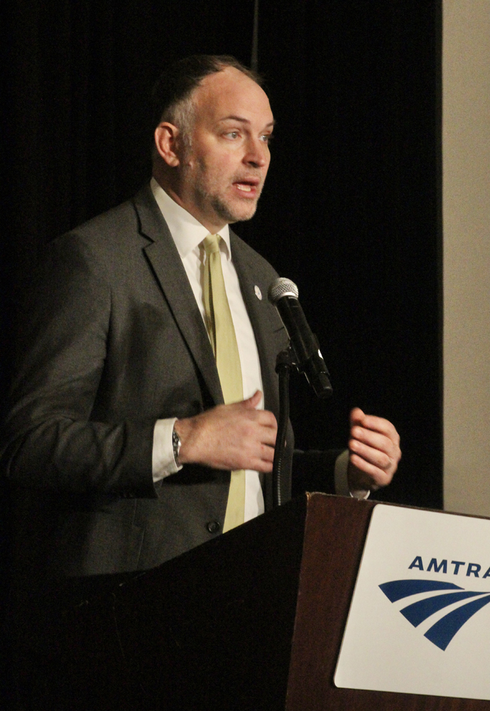 Man standing at podium