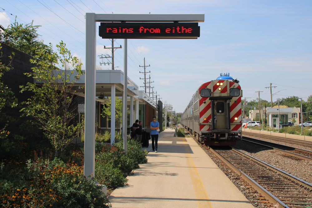 People move on platform at train arrives at station