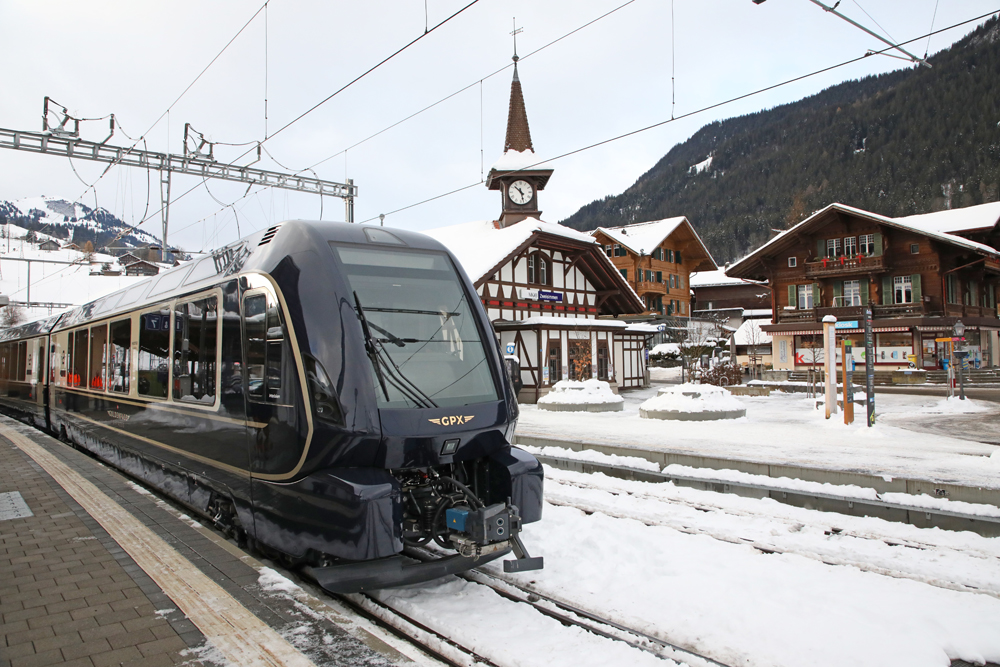 Push-pull train of gauge-changing equipment in snowy Swiss town