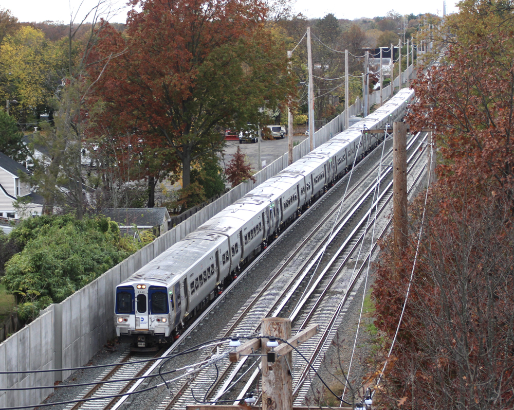 Overhead view of EMU train on three-track main line
