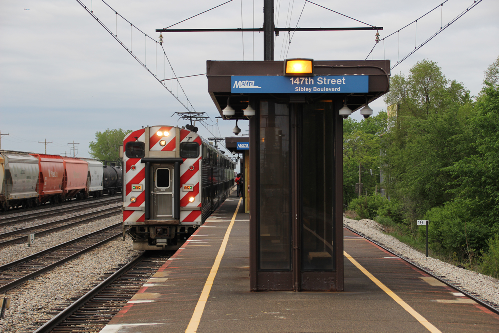 Metra Electric train arriving at station