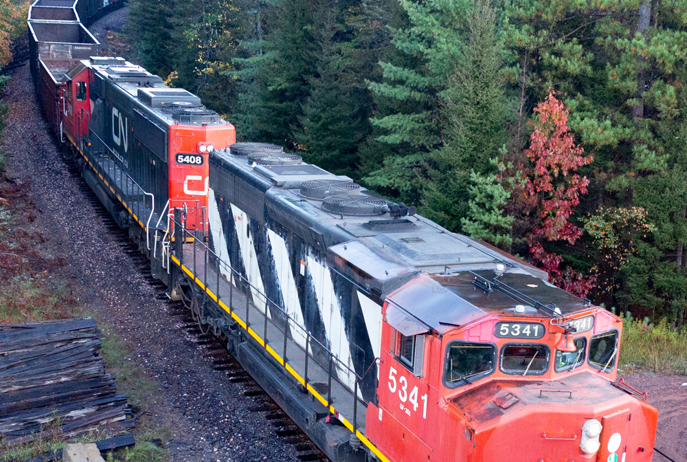 View of top of two locomotives showing protection for roof fans