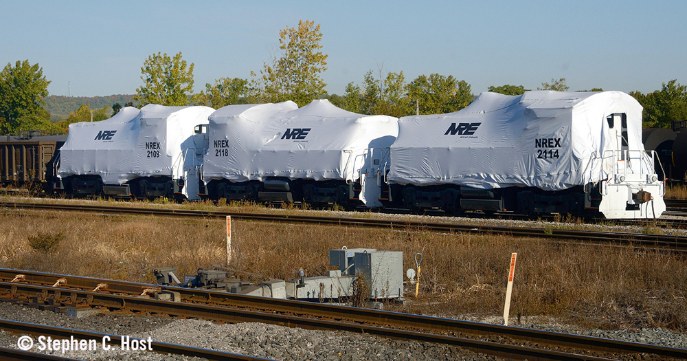 Locomotives covered by tarps