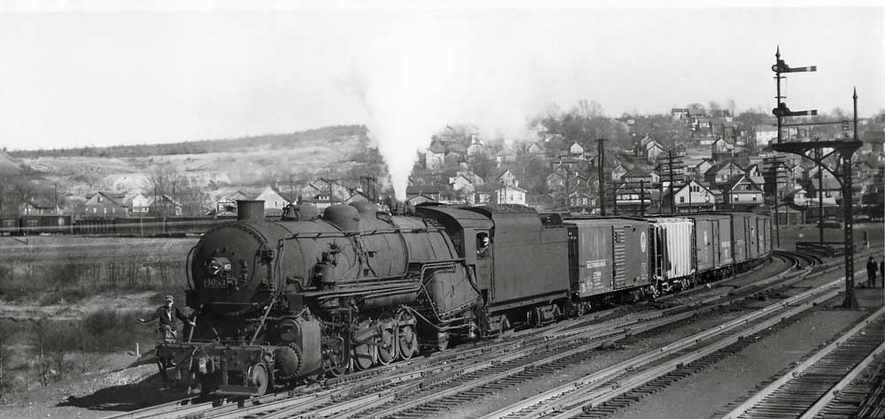 Steam locomotive with freight train on curve