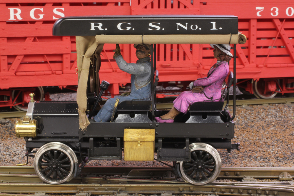 large-scale model of a black railcar