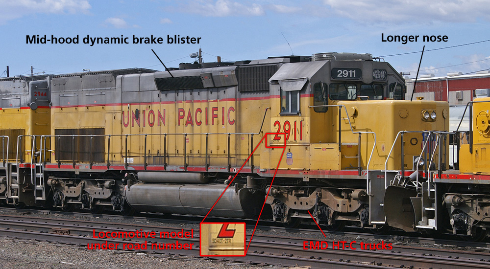 A yellow-and-gray diesel is seen in a nose-on three-quarter angle