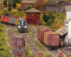 Layout scene with locomotive coming toward you