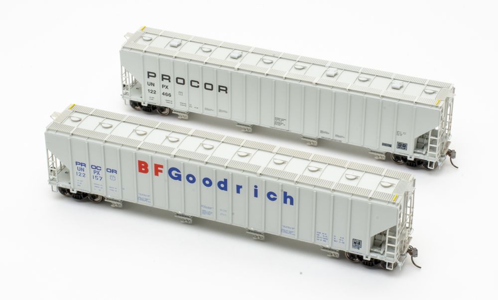 Procor 5280 covered hopper: An image of two gray model freight cars against a white background