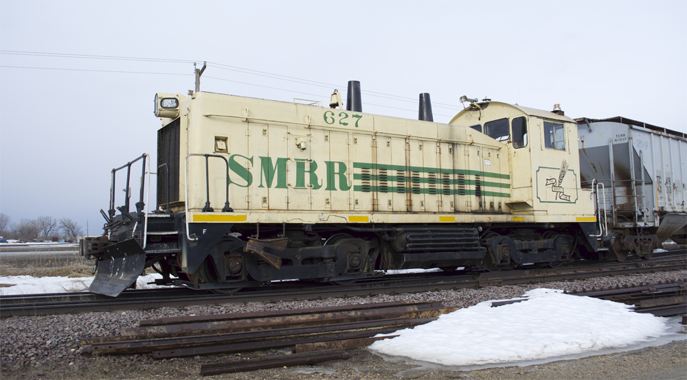 Photo of end-cab switcher with small pile of snow in foreground