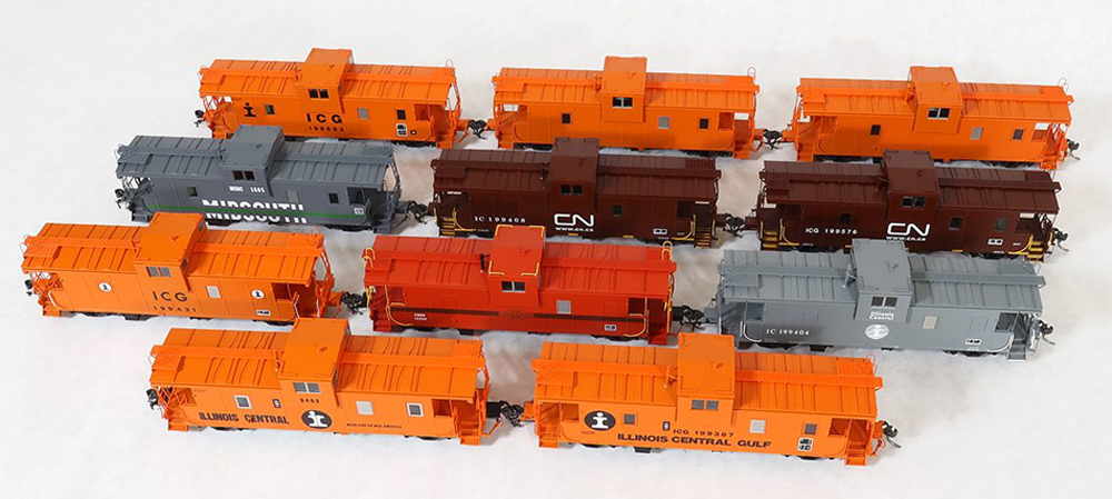 Illinois Central Centralia Shops caboose: An image of model cabooses against a white background.