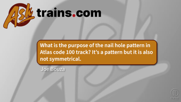 Why is the nail hole pattern on Atlas code 100 track assymetrical?
