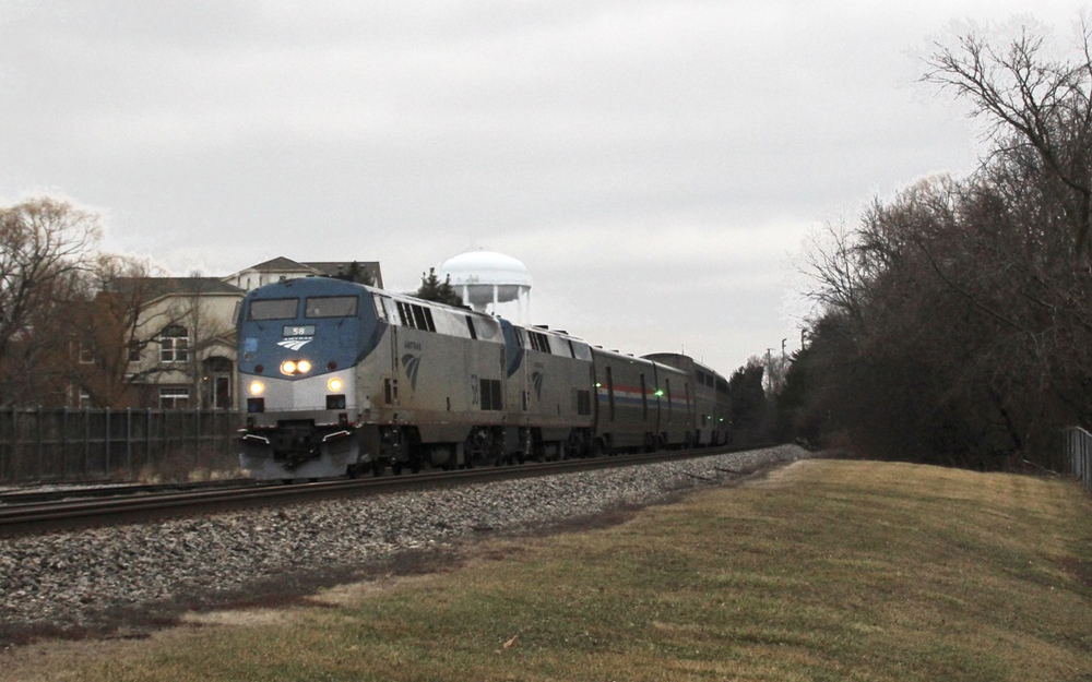 Passenger train rounds wide curve