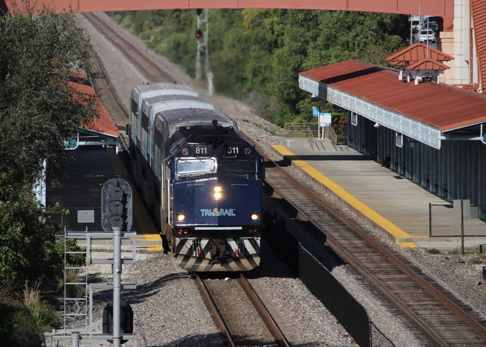 View from bridge of commuter train at station