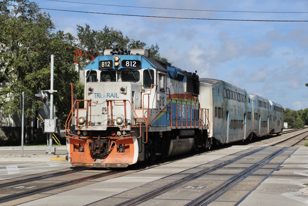 Road-switcher locomotive with commuter train