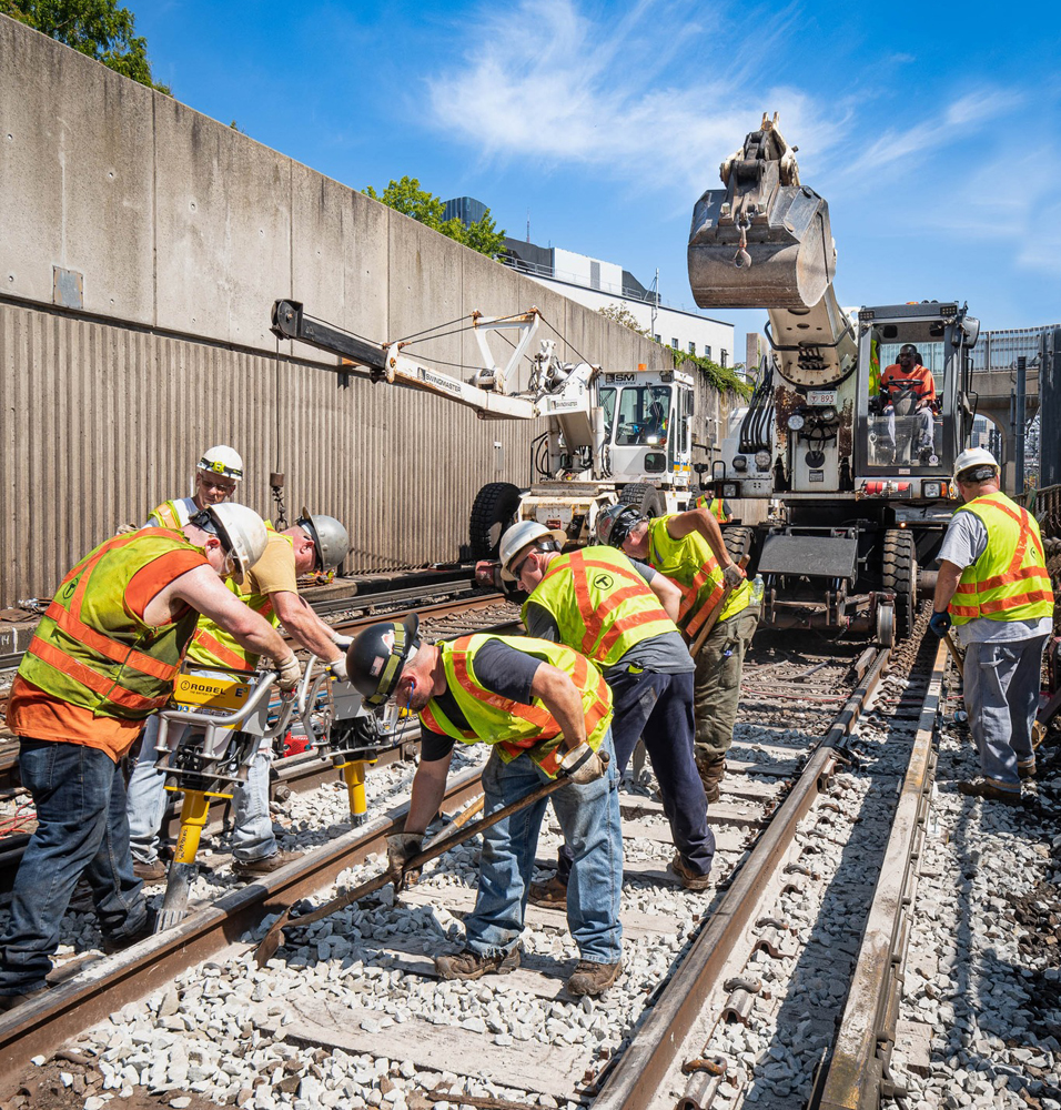 Workmen repair track