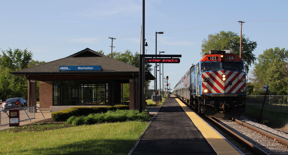 Commuter train arrives at station