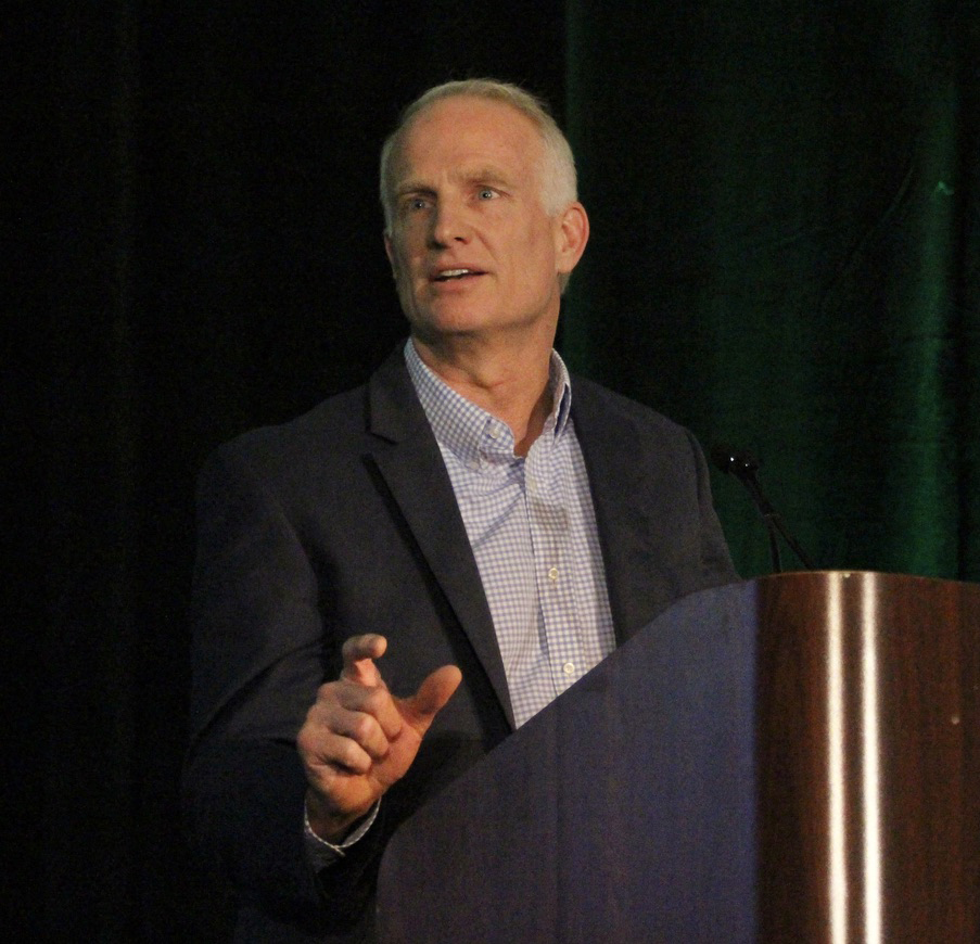 Man speaking at podium