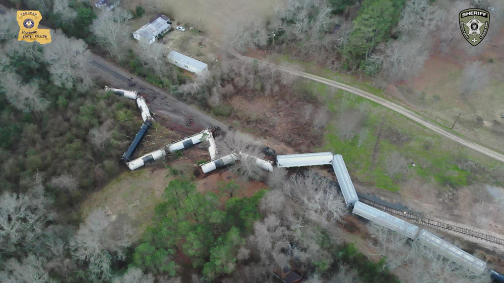 Image from drone of derailed tank cars and covered hoppers