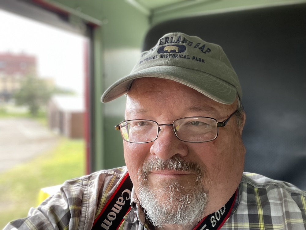 man with hat and glasses