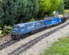model blue engine approaching on trac
