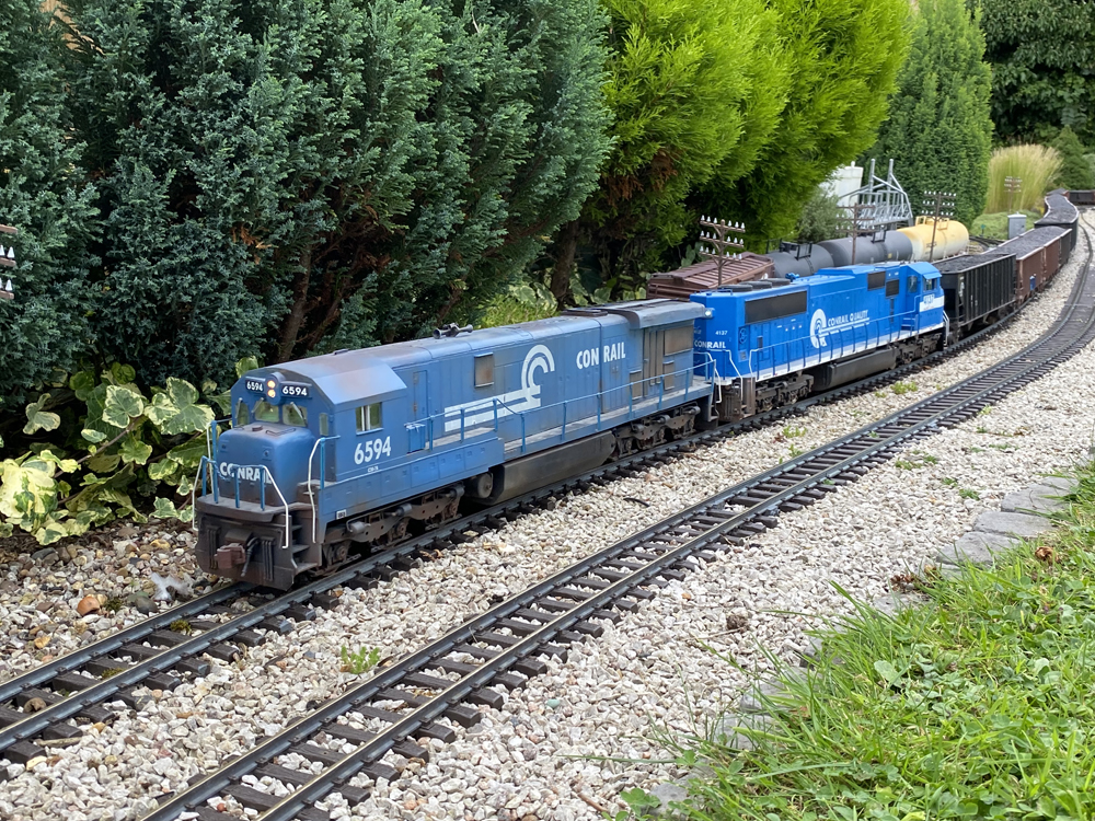 model blue engine approaching on trac