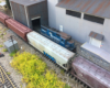 Modeling Conrail in the UK; model locomotive with hoppers