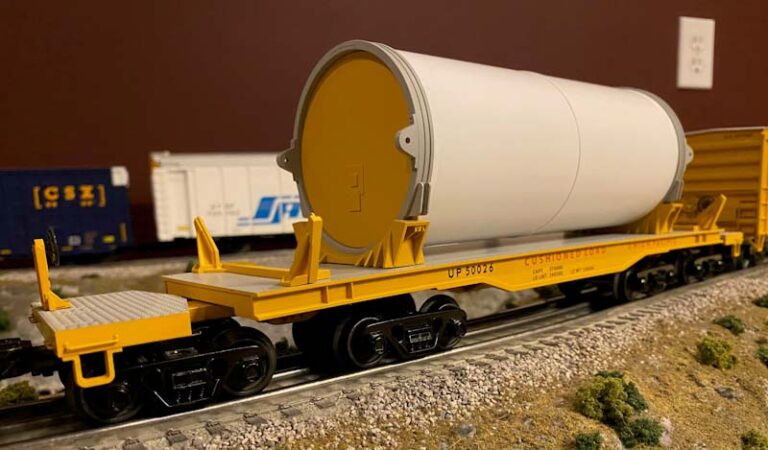 Lionel Union Pacific Rocket Booster Train segment on flatcar