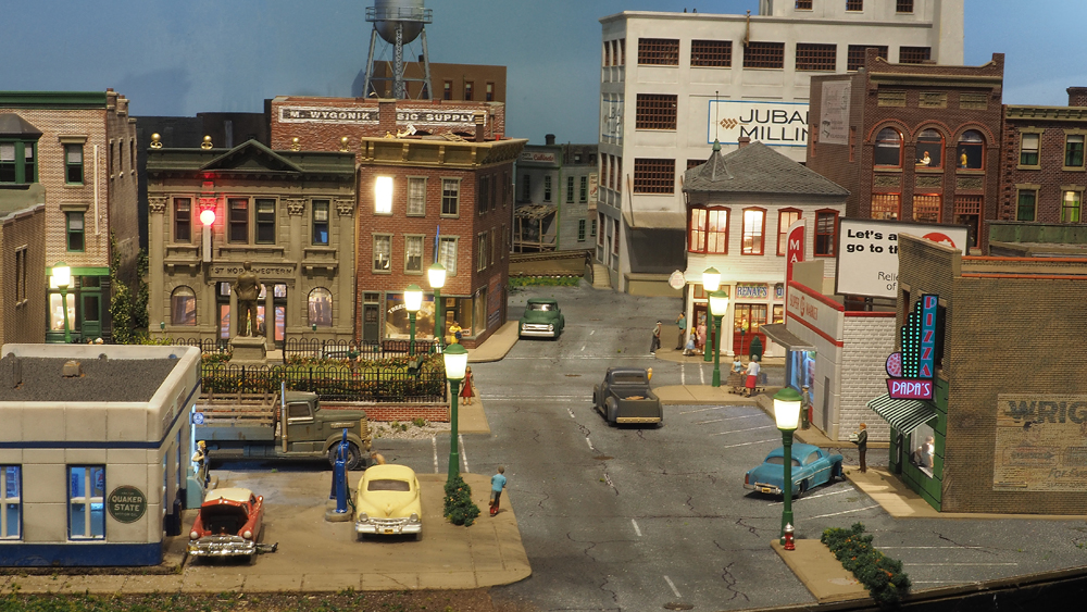 model city scene on train layout