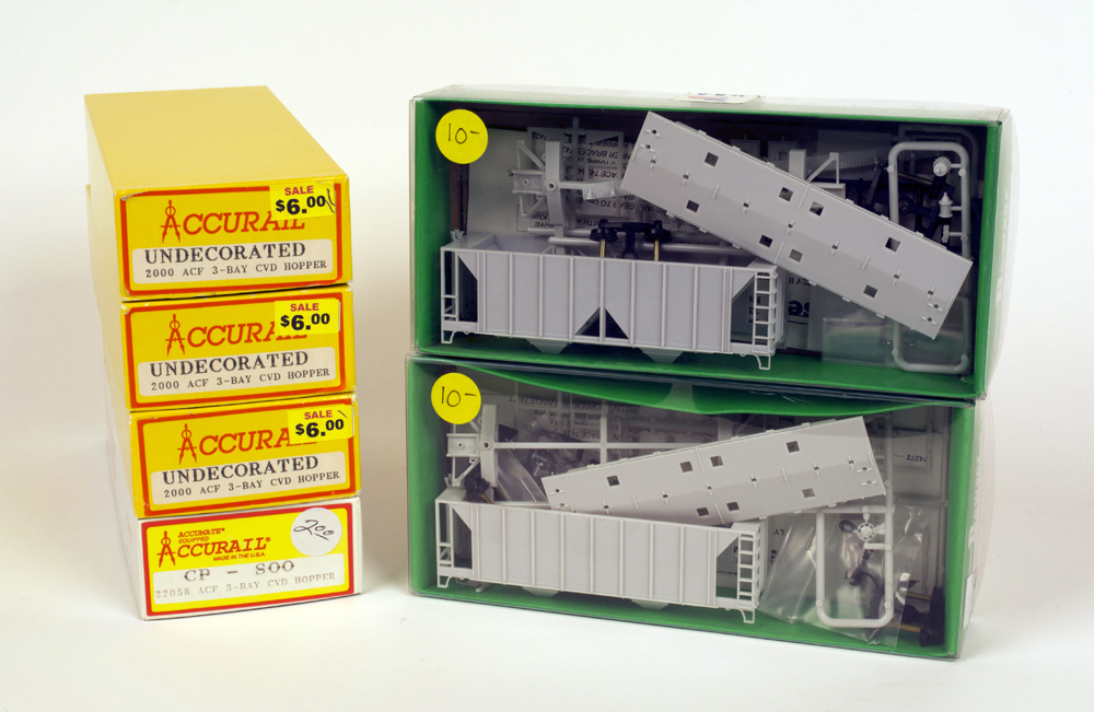 Photo of HO scale model railroad boxes on white background.