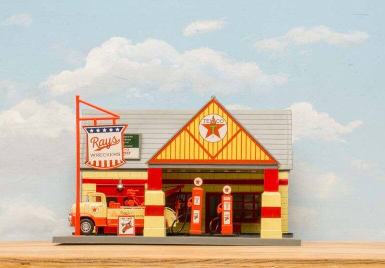 Menards O scale Rays Wrecker building against backdrop