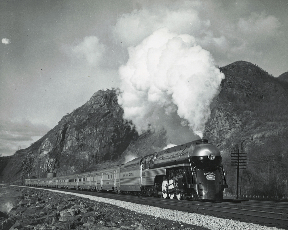 Black and silver streamlined steam passenger train