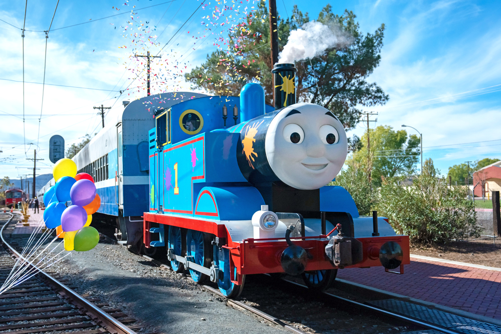 blue and white Thomas engine with paint splatter