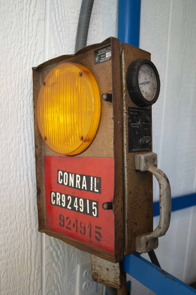 Box with large orange lens and Conrail lettering