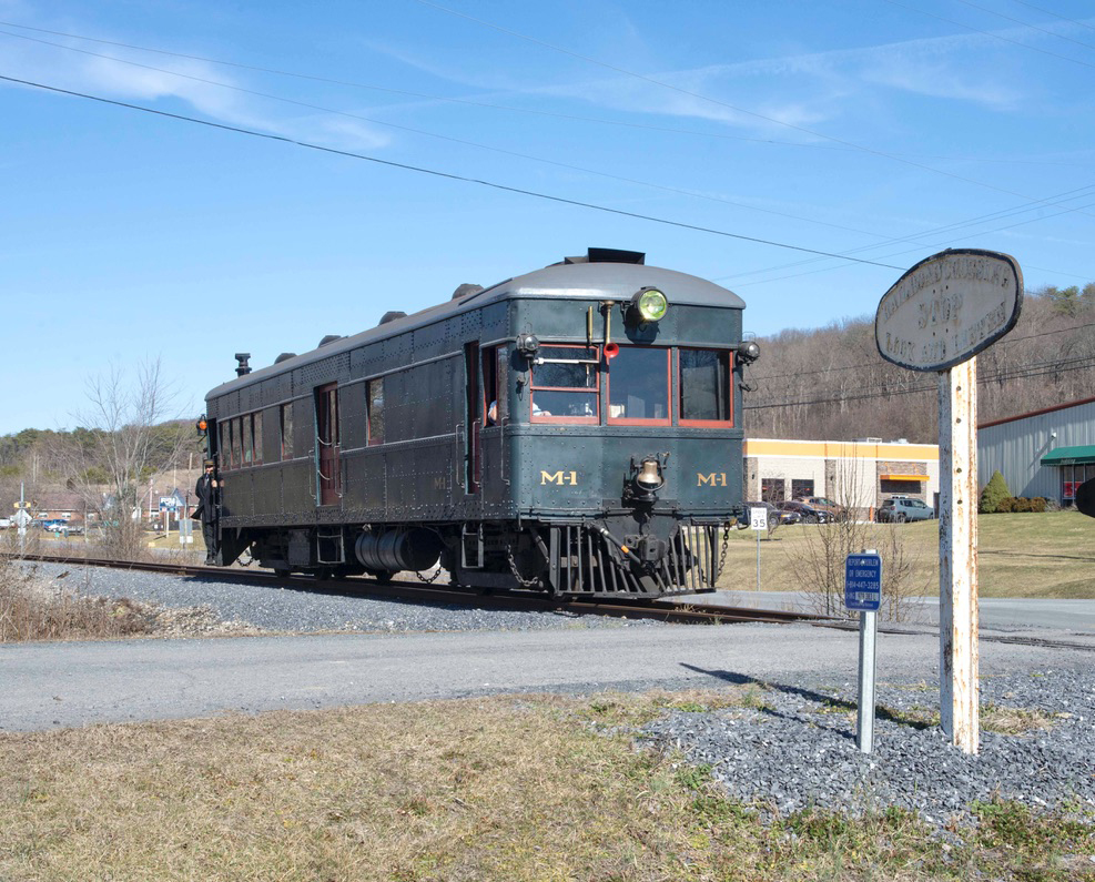 Gas-electric car at grade crossing