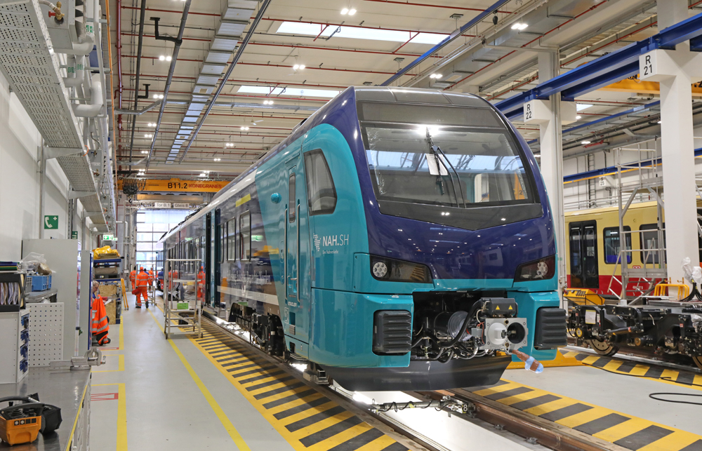 Blue battery-electric multiple-unit trainset uner construction