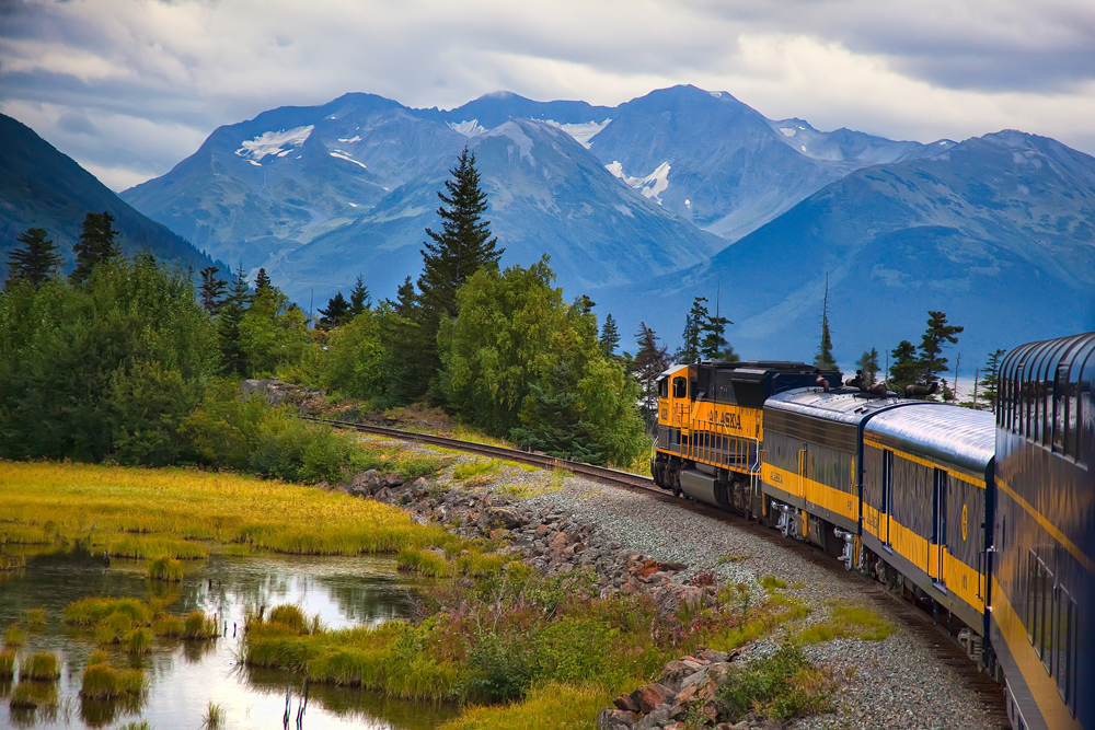 Train with mountains in distance