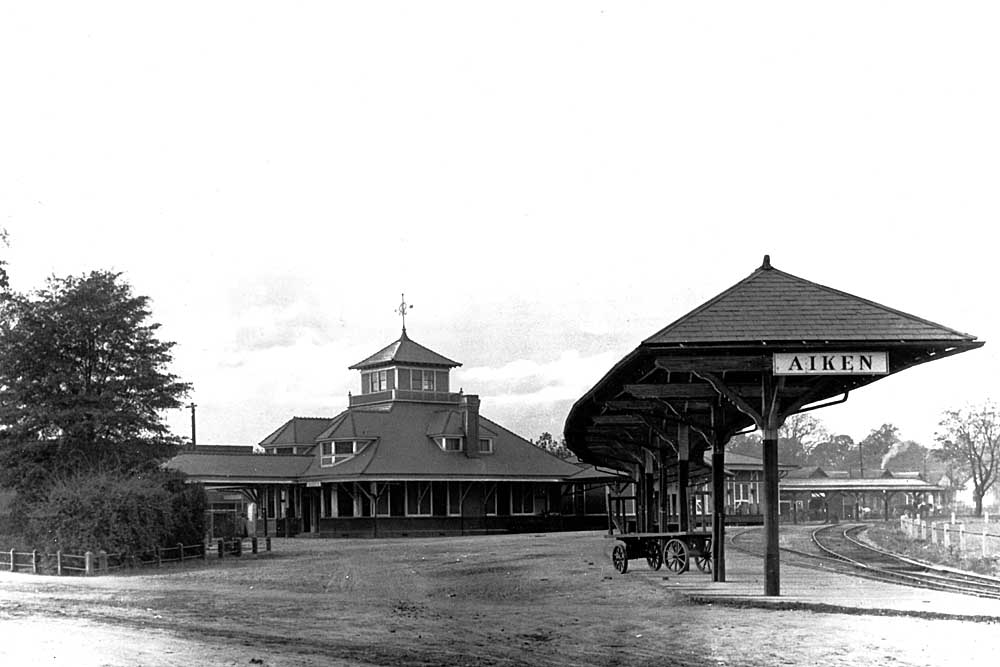 Passenger train station in black-and-white