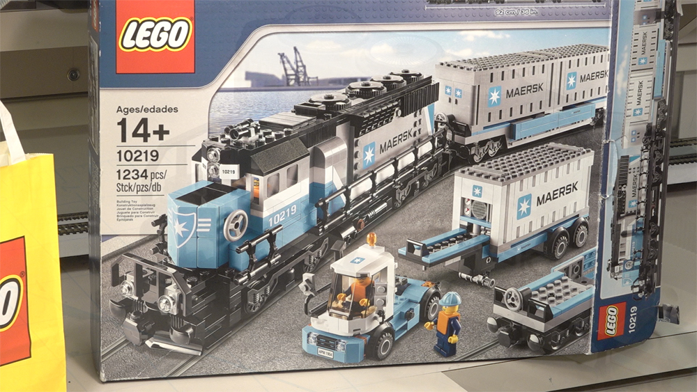 Box showing Lego model of a modern intermodal train and truck