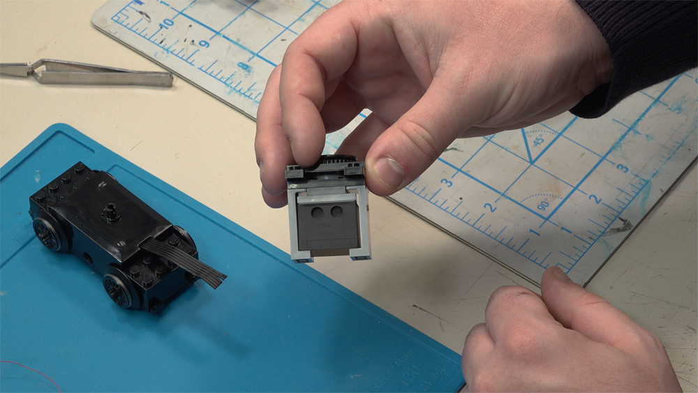 Speaker enclosure mount built out of Legos