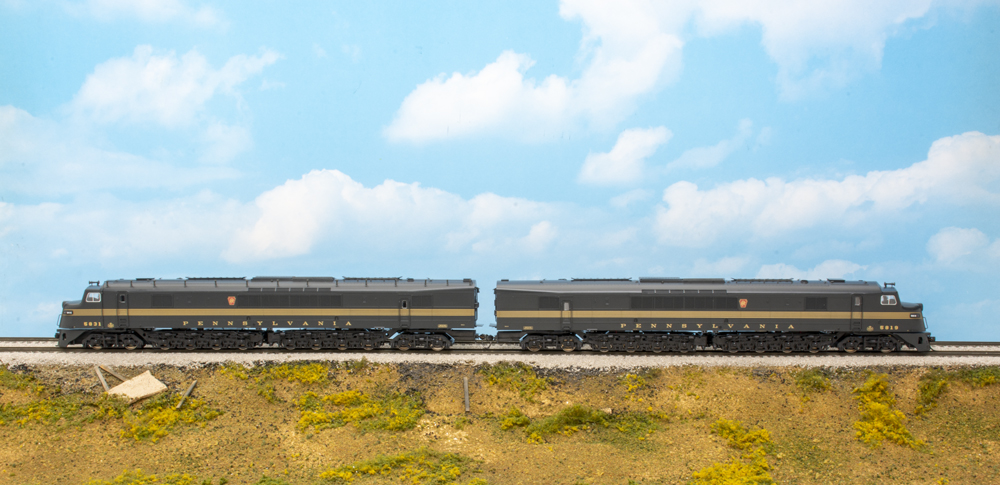 Models of two long streamlined diesel locomotives