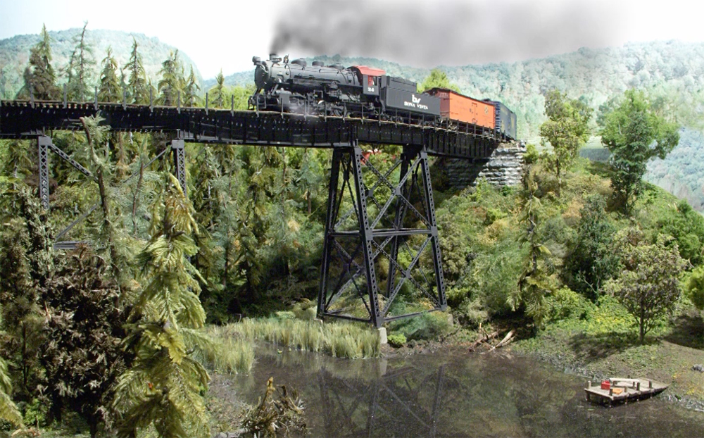 An image of a forested model railroad layout