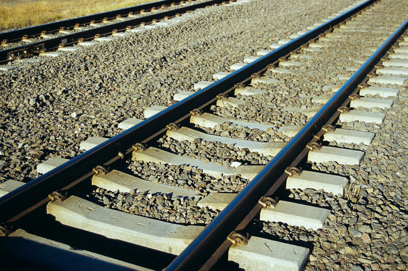 Track type and uses: An image of concrete railroad ties