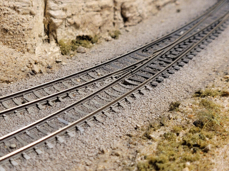 Track type and uses: An image of a model turnout on a model railroad layout