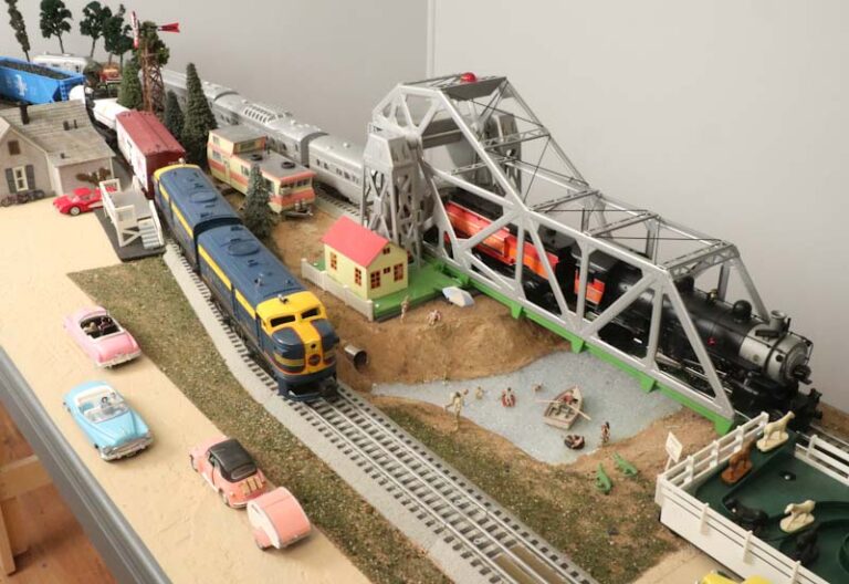 prewar and modern trains on a layout with a bascule bridge