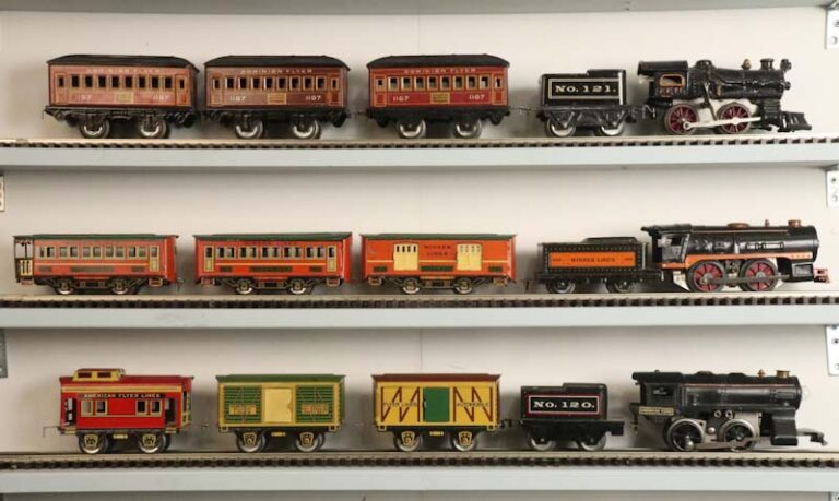a collection of old winner and American flyer trains