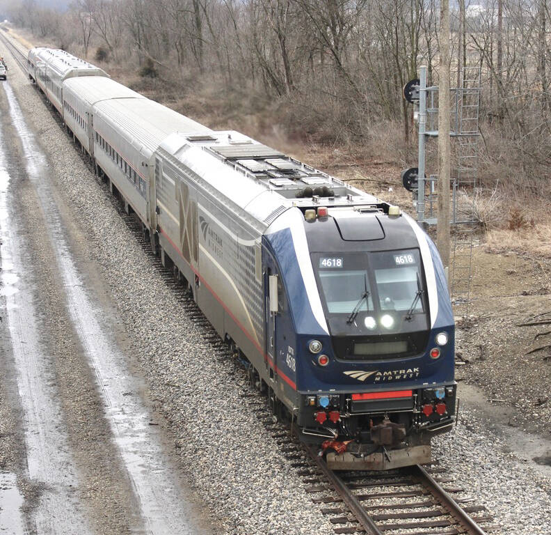 Passenger train under gray skies