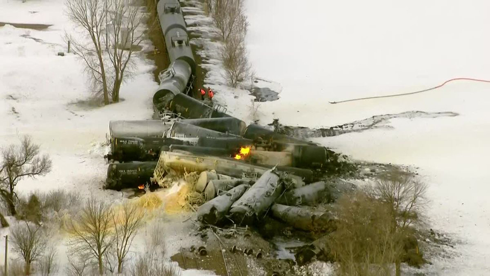 Derailed and burned tank cars