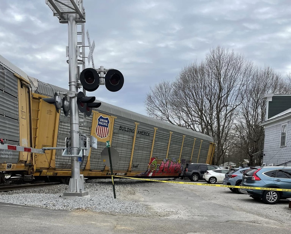 Derailed auto rack