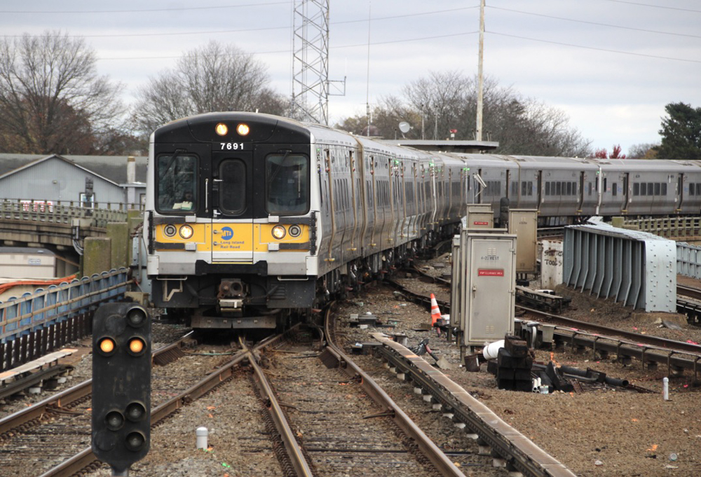 Electric multiple-unit trainset crosses tracks at junction